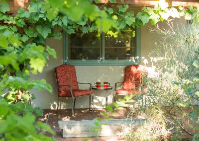 Two chairs on a patio at one of the best hotels in Farmington NM.