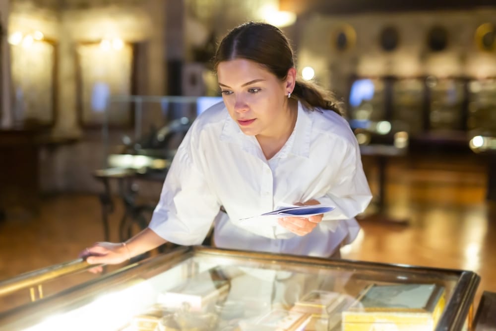 Woman enjoying museum exhibits at places like the Albuquerque Museum