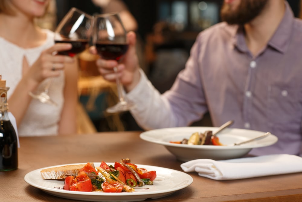 Couple enjoying a meal at one of the most romantic restaurants in Albuquerque