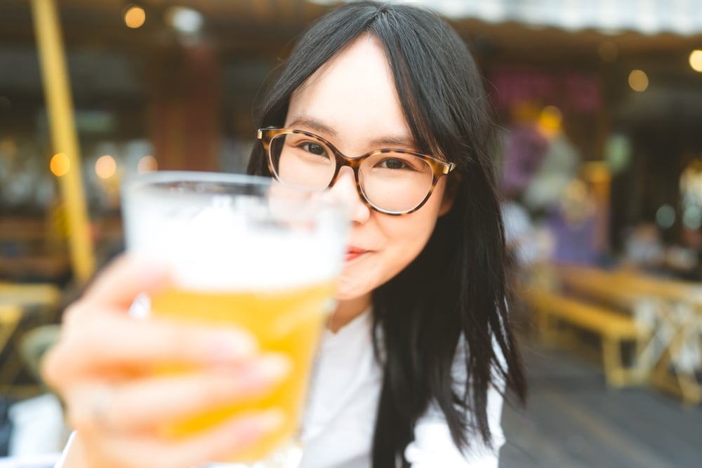 Woman enjoying a pint of Beer at Marble Brewery and other top breweries in Albuquerque