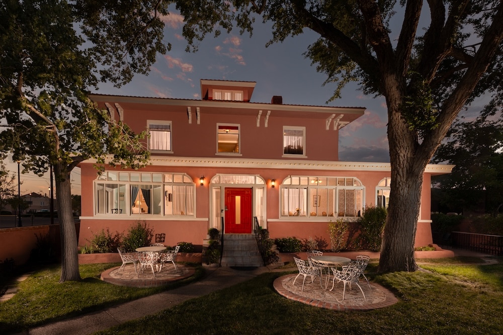 Exterior at dusk of the Bottger Mansion, a top Bed and Breakfast in Albuquerque