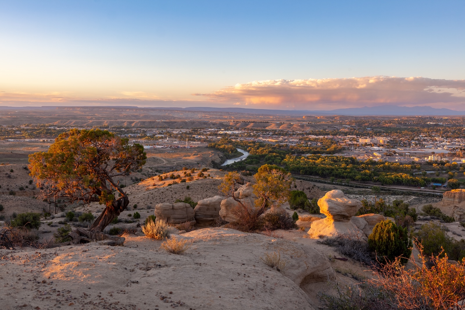 San Juan River and city of Farmington, NM, at sunset.
